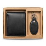 Two-piece corporate gift set featuring a stitched leather-style wallet and matching oval keychain in a kraft presentation box.