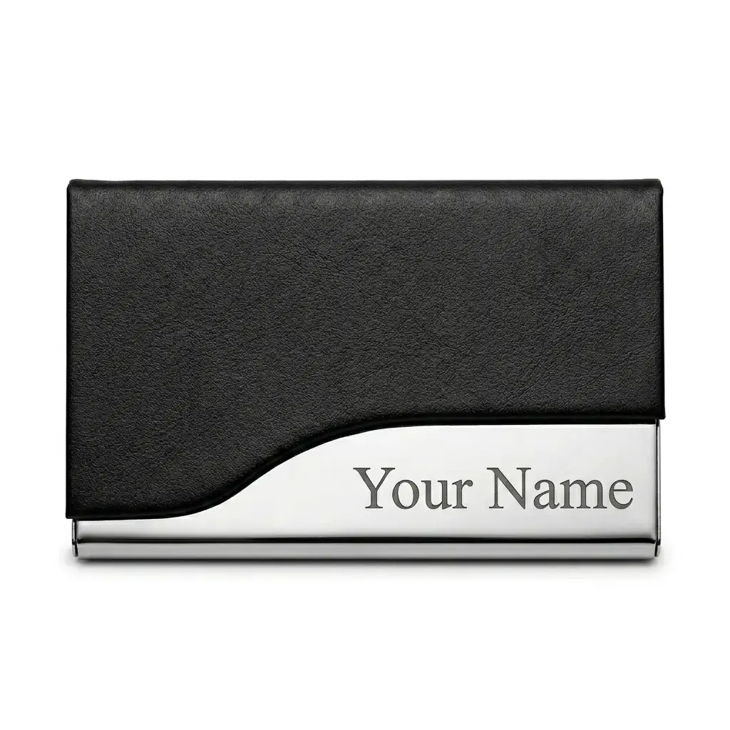 Black faux-leather and polished stainless steel business card holder featuring custom engraved text on the metal base.
