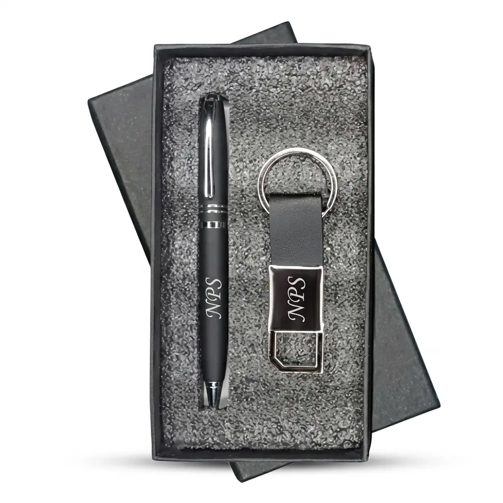 Custom Executive Pen and Keyring Gift Box Matte black pen and leatherette keyring with custom silver engraving, neatly presented in a black foam-lined gift box.