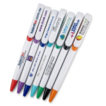 A collection of white retractable ballpoint pens featuring different coloured tips and custom printed company logos on the barrels and wide clips.