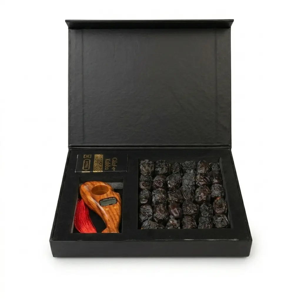 Islamic Corporate Dates Gift Box Matte black Islamic corporate gift box containing a wood-grain digital tally counter, Gilaf-e-Kaaba keepsake, and a section of custom dates.